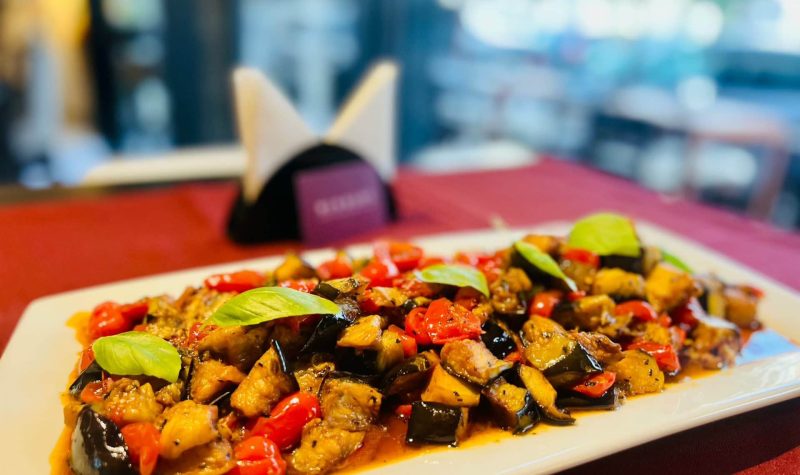 Mushroomed aubergines with cherry tomatoes, a local delicacy.